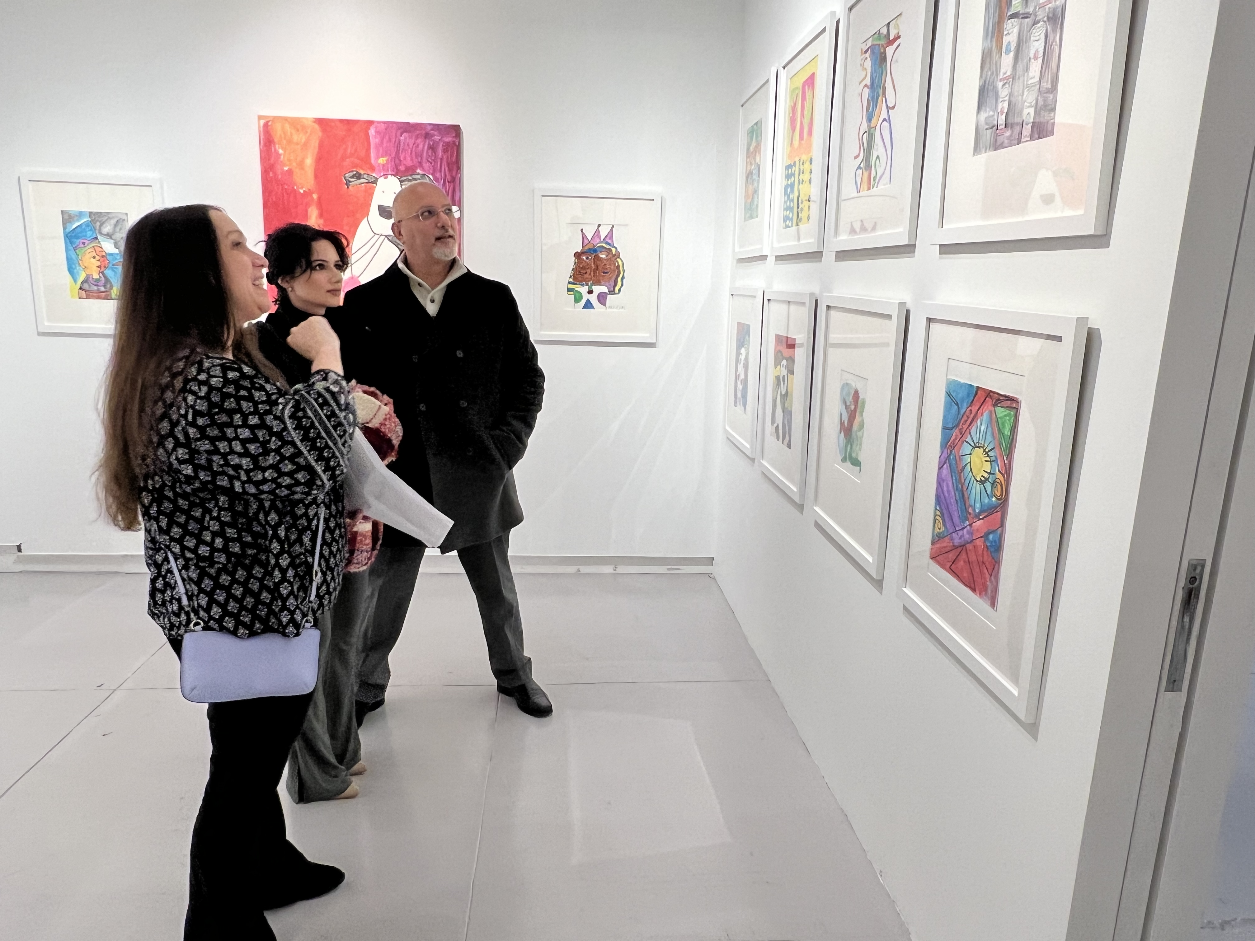 Visitors admiring the ArtAbility Exhibition at the Agora Gallery